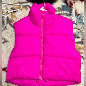 Neon pink puffer vest